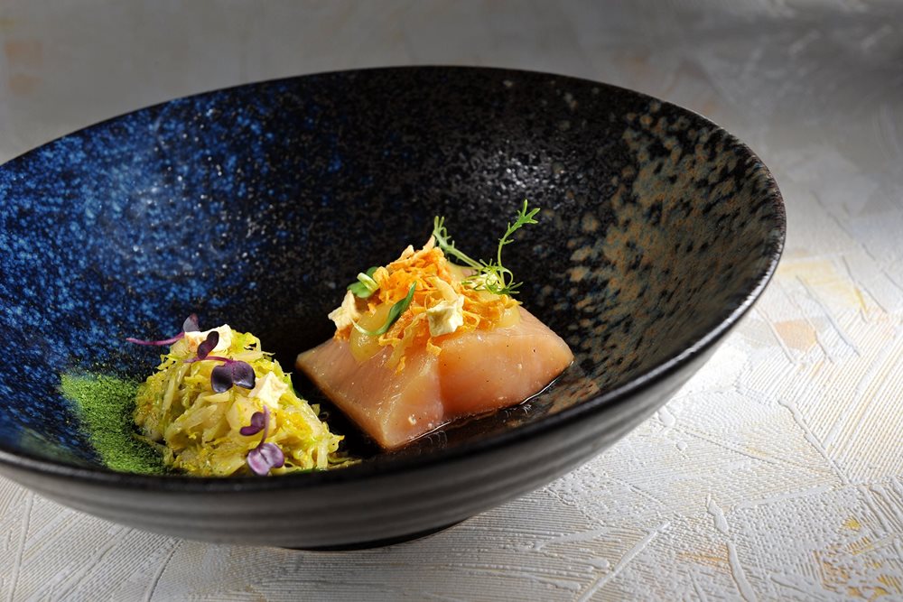 Brook trout from Štampach, celery, consommé, brussels sprout